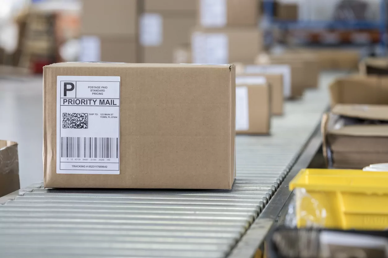 cardboard box waiting to be shipped in distribution warehouse